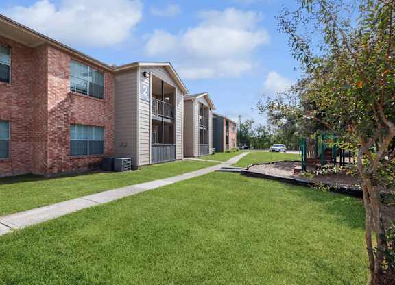 Exterior landscaping at Forest Creek Apartments in Houston TX