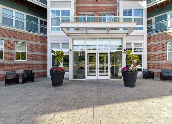 Exterior Leasing Center Entrance at Axis Admiral Hill Apartments in Chelsea MA