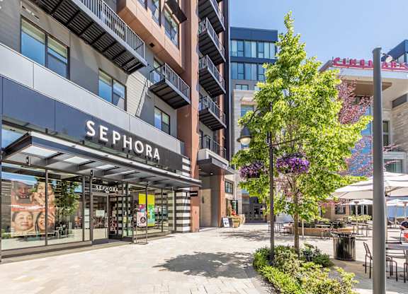 A Sephora store is located in a shopping plaza.