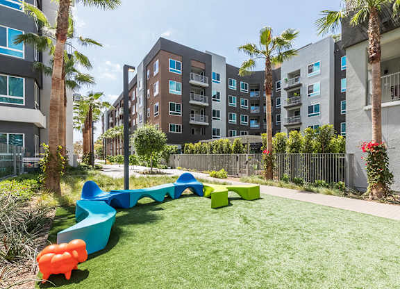 Exterior Paseo Life and Energy Seating Close Up at Vita Apartment Homes in Orange CA