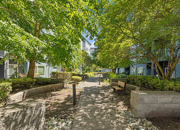 Walkway and benches at Riverpark Apartments in Redmond WA