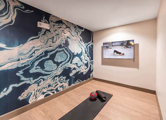 Fitness center stretching area at Cala Apartments in Austin TX