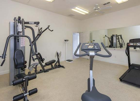 Fitness center at Whispering Oaks Apartments in Portsmouth VA