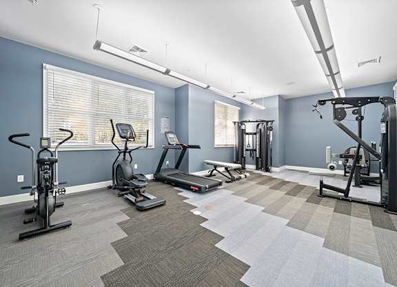 Fitness center machines at Grand Oaks Apartments in Chester VA