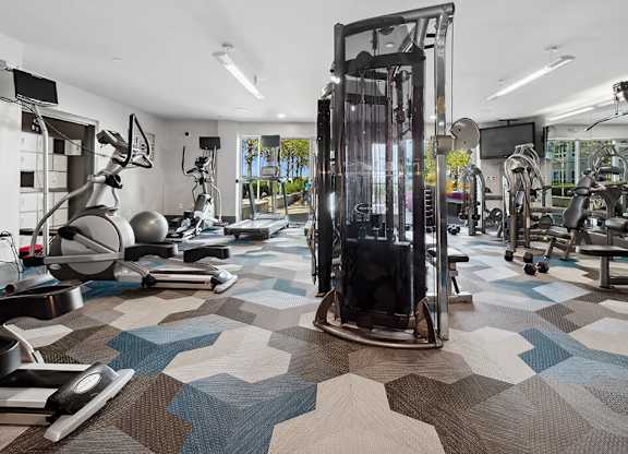 Fitness center at Axis Admiral Hill Apartments in Chelsea MA