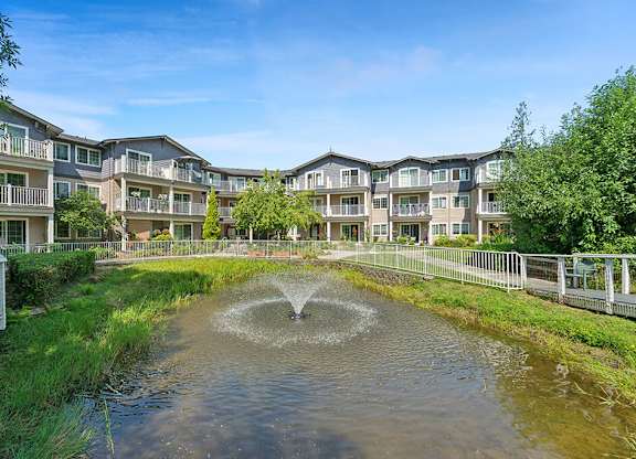 Fountain outside at Woodlands at Forbes Lake Apartments in Kirkland WA