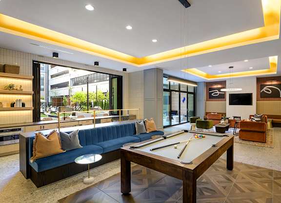 Game room and social lounge at 333 Ellington Apartments in Gaithersburg MD