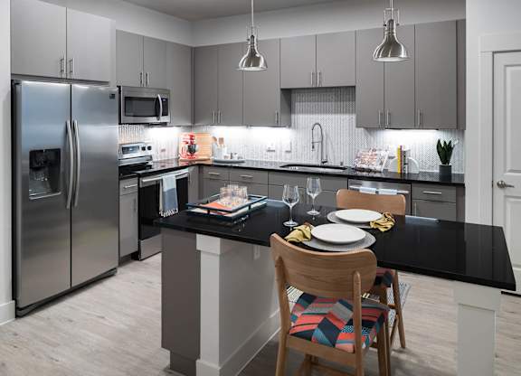 Kitchen island at Jada Legacy Central Apartments in Plano TX