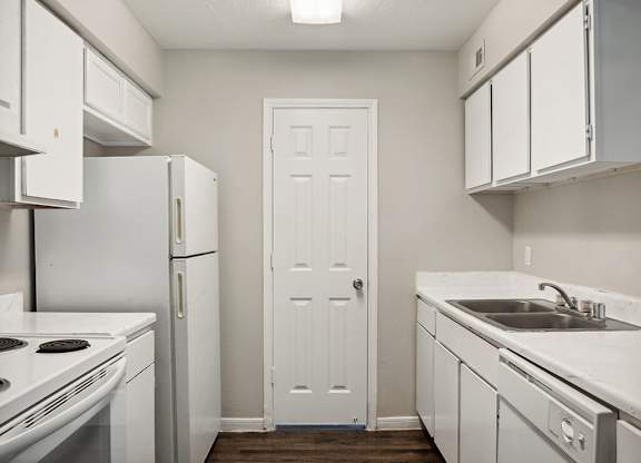 Kitchen cabinets at Park Village Apartments in Conroe TX