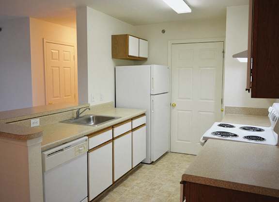Kitchen area at Whispering Oaks Apartments in Portsmouth VA
