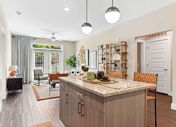 Kitchen and living room at Verge Apartments in Atlanta GA