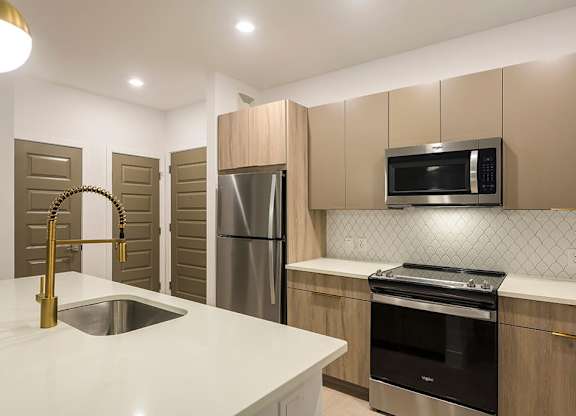 Kitchen with light cabinets at 333 Ellington Apartments in Gaithersburg MD