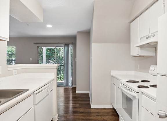 Kitchen with oven at Park Village Apartments in Conroe TX
