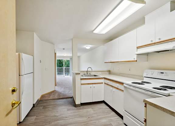 Kitchen at Woodlands at Forbes Lake Apartments in Kirkland WA(1)