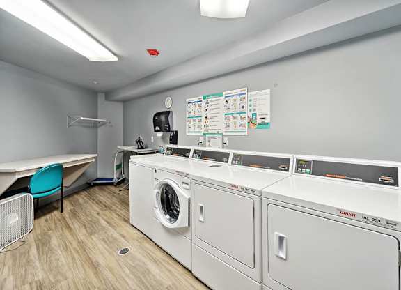 Laundry facilities at Woodlands at Forbes Lake Apartments in Kirkland WA