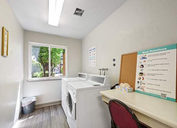 Laundry Room at Auburn Court Apartments in Auburn WA