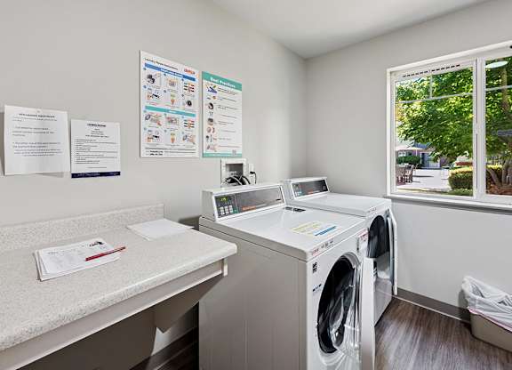 Laundry room at Lakewood Meadows Apartments in Lakewood WA