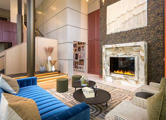 Leasing center fireplace and lounge at 333 Ellington Apartments in Gaithersburg MD