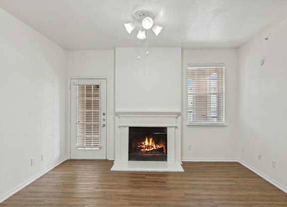 Living room with fire place at Cypress View Villa Apartments in Weatherford TX