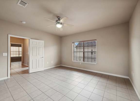 Living room with ceiling fan at Parkway Ranch Rental Homes in Houston TX