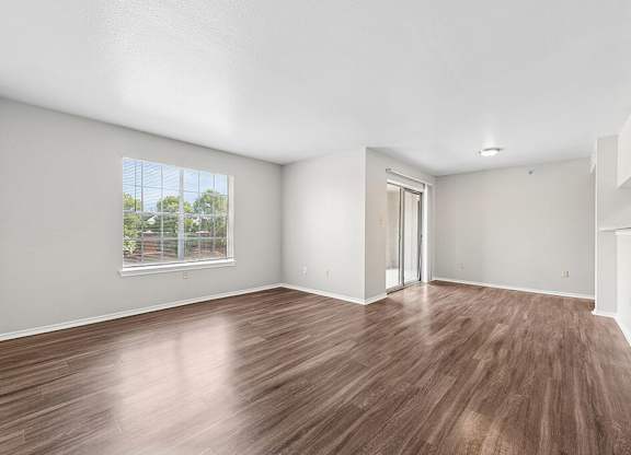 Living room and dining room at Valley Trails Apartments in Irving TX