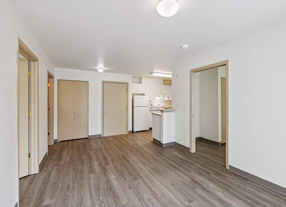 Living room and kitchen at Ballinger Court Senior Apartments in Edmonds WA