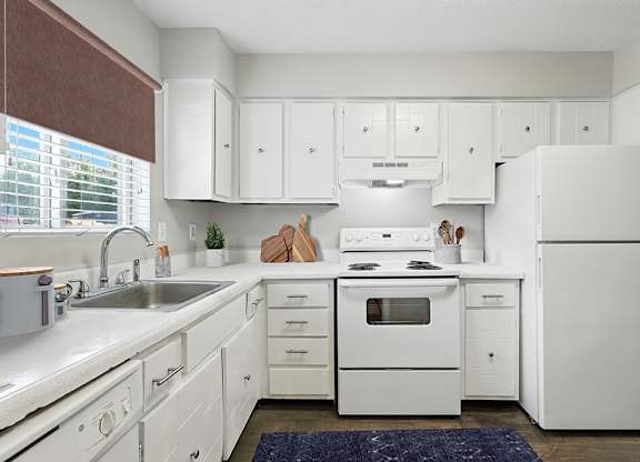 Kitchen with white cabinets at City Side Flats Apartments in Nashville TN