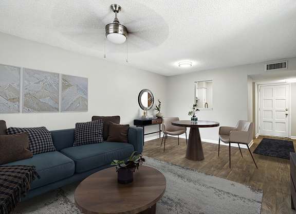 Living room with ceiling fan at City Side Flats Apartments in Nashville TN