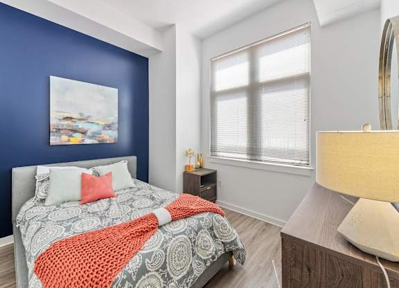 Bedroom with hardwood flooring at Bradley Braddock Road Station Apartments in Alexandria VA