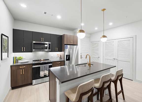 Model Concrete Design Package Kitchen Angled at East Bend Apartments in Houston TX
