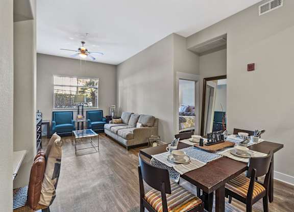 Dining and living room at Madison at Town Center Apartments in Santa Clarita CA