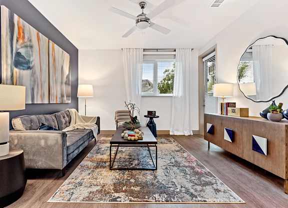 Living room with ceiling fan at Altitude Apartments in South San Francisco CA