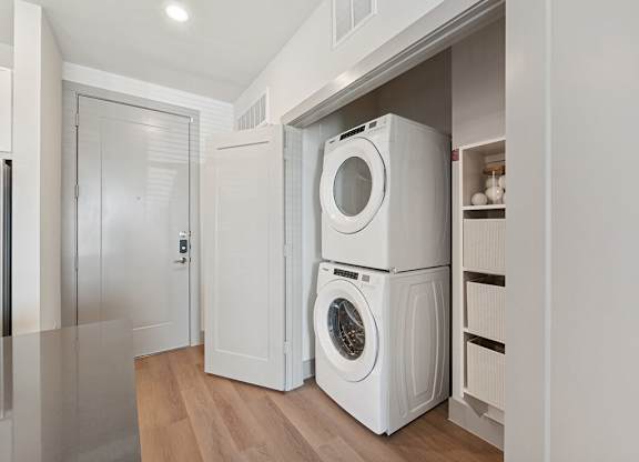In unit stacked laundry at Heights at 1520 Apartments in Houston TX