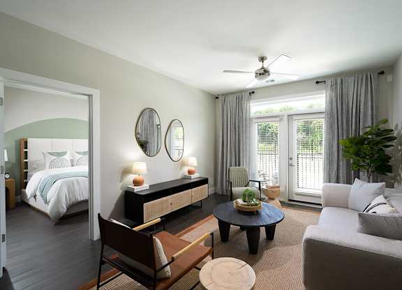 Living room with ceiling fan at Verge Apartments in Atlanta GA