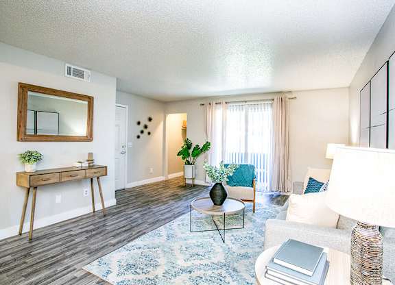 a living room with a couch and a table