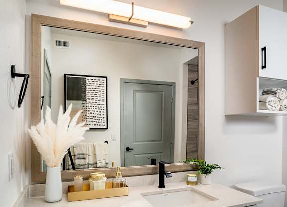 Model Pewter Bathroom Mirror at Chroma Apartment Homes in Canoga Park CA