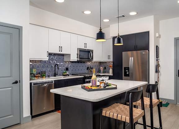 Model Pewter Kitchen Angled at Chroma Apartment Homes in Canoga Park CA