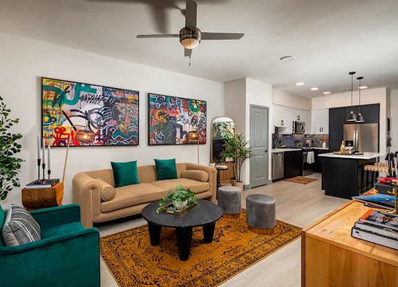 Model Pewter Living Room and Kitchen at Chroma Apartment Homes in Canoga Park CA