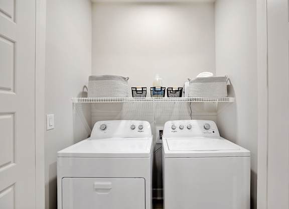 Model Sandalwood Design Package Washer and Dryer at 1810 Main Apartments in Houston TX