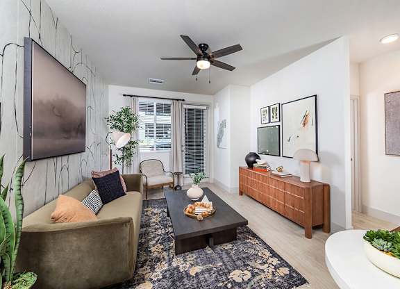 Model snow design living room at Olivean Apartments in Broomfield CO