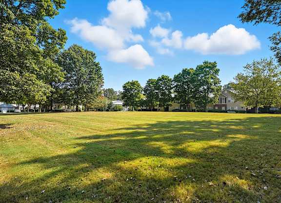 Outdoor green space at Chroma Park Apartments in Austell GA