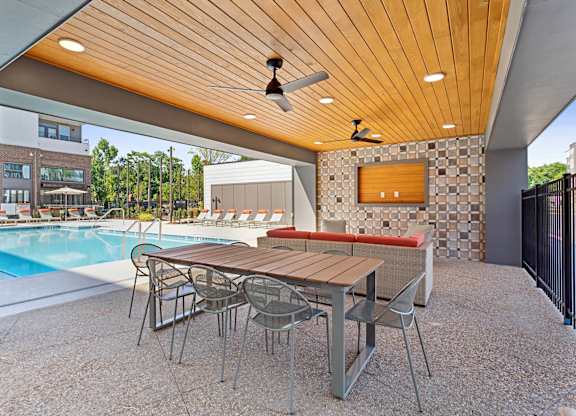 Outdoor patio seating at Verge Apartments in Atlanta GA