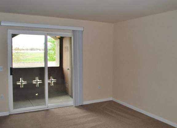 Living room patio door at Bristol Apartment Homes in Dixon CA