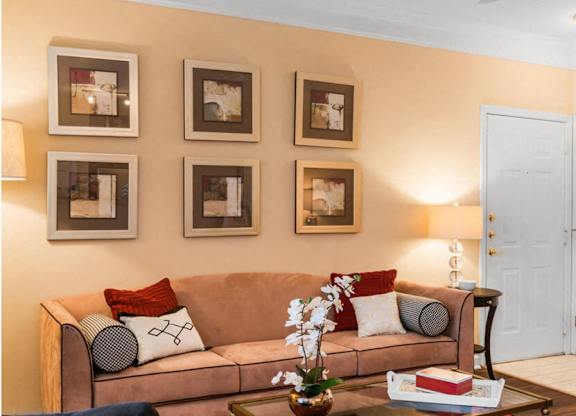 living room with 9' ceilings at River Pointe at Den Rock Apartments in Lawrence, MA