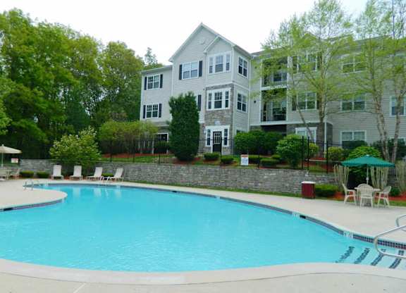 Large swimming pool at River Pointe at Den Rock Apartments in Lawrence, MA