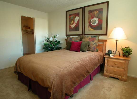 Primary bedroom at Timberleaf Apartments in Lakewood CO