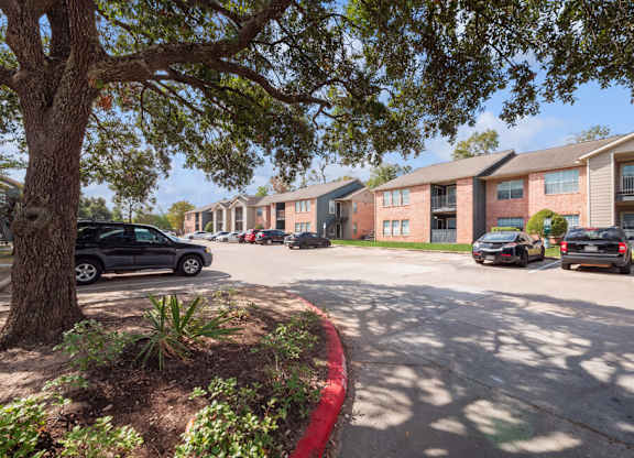 Parking area at Forest Creek Apartments in Houston TX