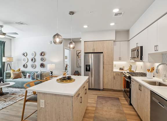 Kitchen and living room at The Braydon Apartments in Napa CA