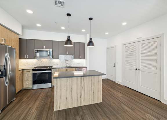 Kitchen with island at The Braydon Apartments in Napa CA