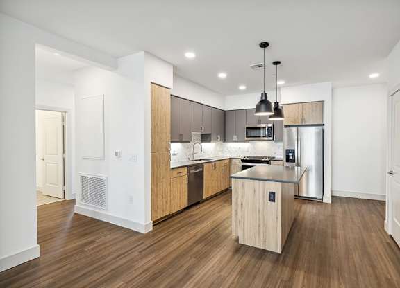 View of kitchen from living room at The Braydon Apartments in Napa CA